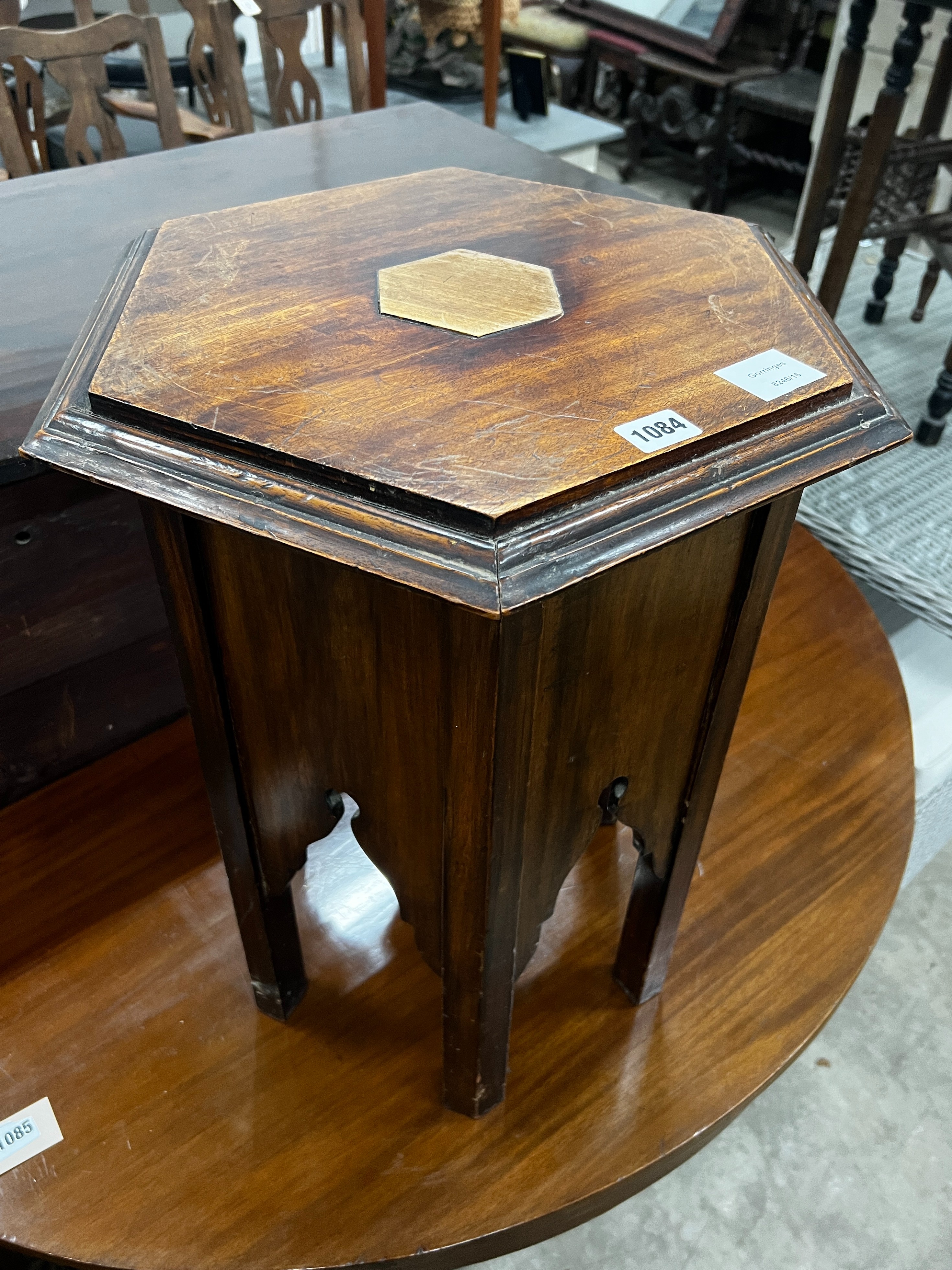 A Liberty style Moorish hexagonal hardwood occasional table, width 45cm, height 54cm